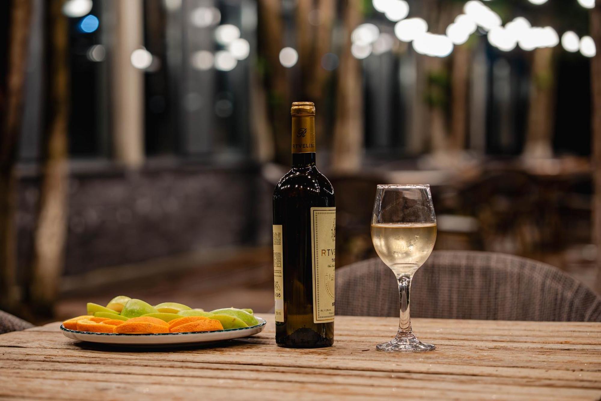 Bakuriani Inn Exterior photo A bottle of white wine