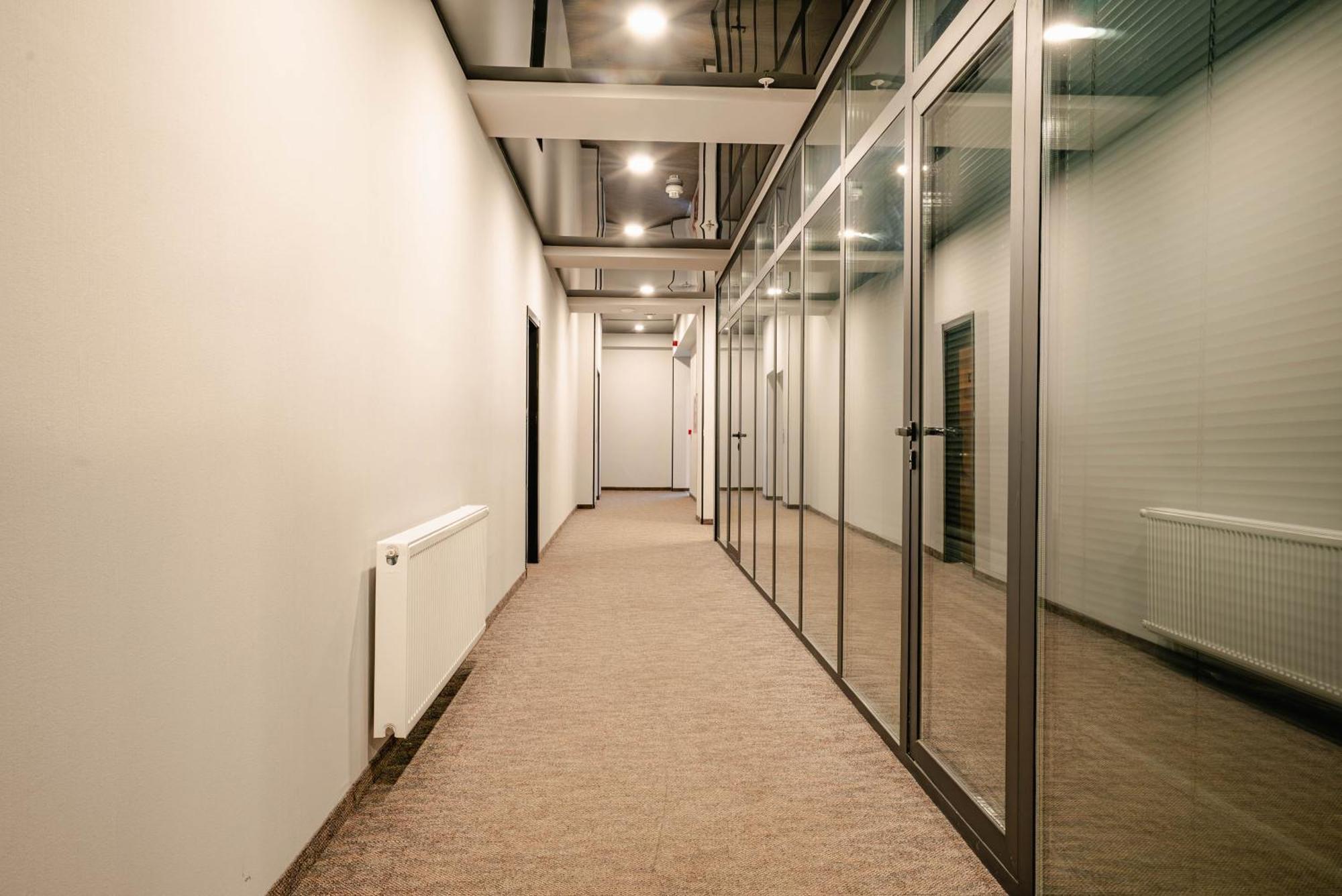 Bakuriani Inn Exterior photo A corridor in a modern office