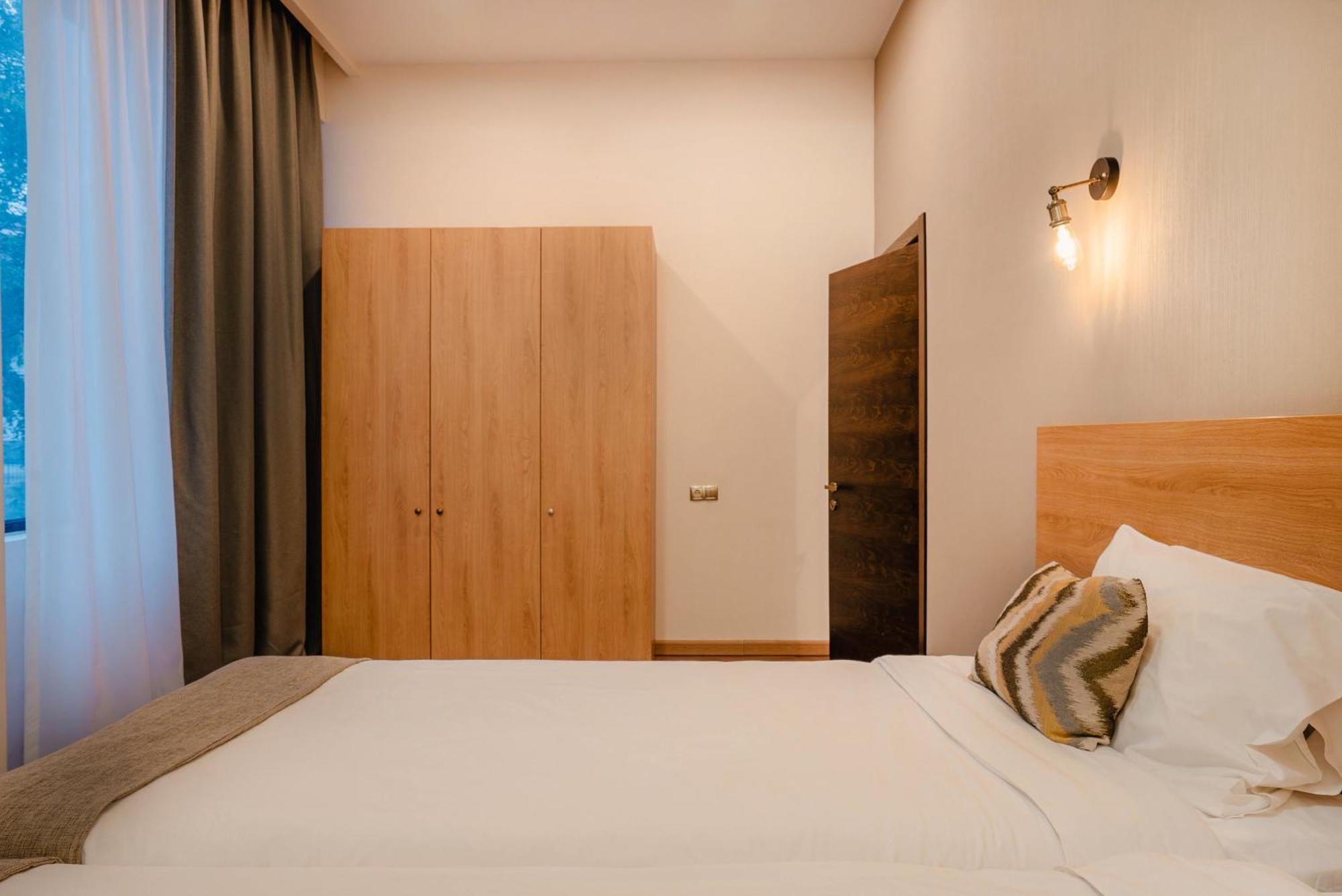 Bakuriani Inn Room photo A bedroom at the hotel